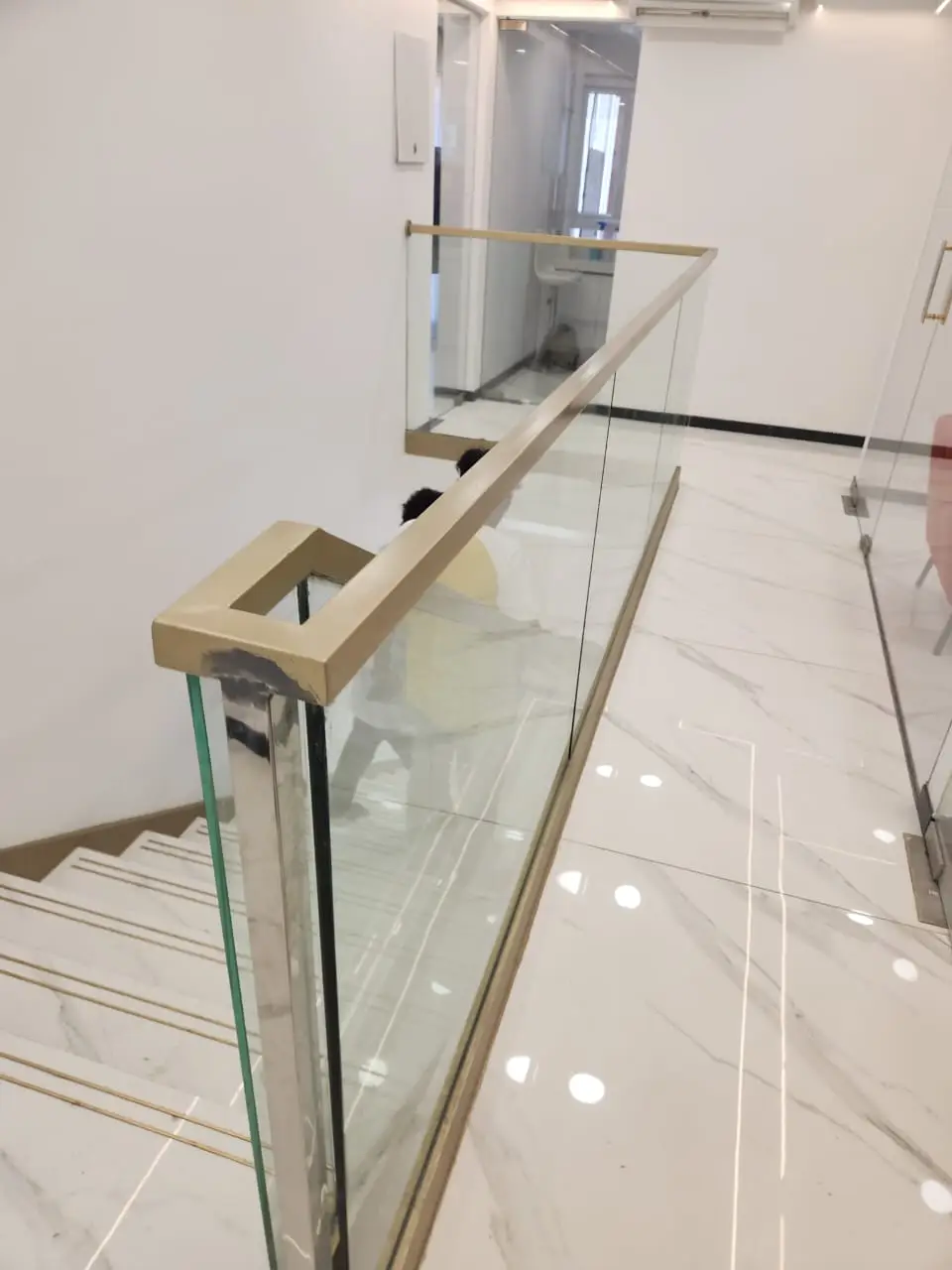 Stainless steel glass railling and Metal Staircase manufactured by happyhomegrill in borivali