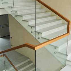 Modern staircase glass railing with stainless steel fabrication