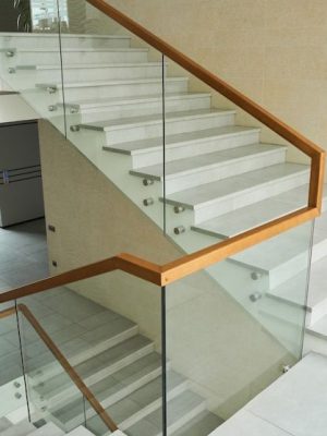 Modern staircase glass railing with stainless steel fabrication