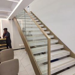 Stainless steel glass railling and Metal Staircase manufactured by happyhomegrill in borivali