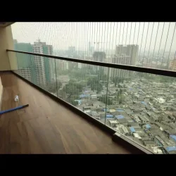 Stainless steel glass railing installed in Mumbai balcony
